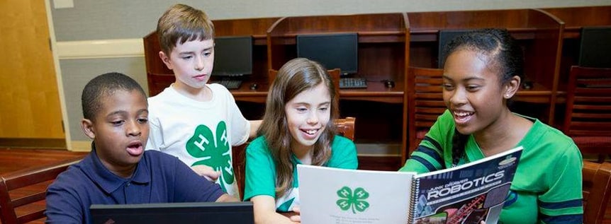 4-H students with a robotics kit