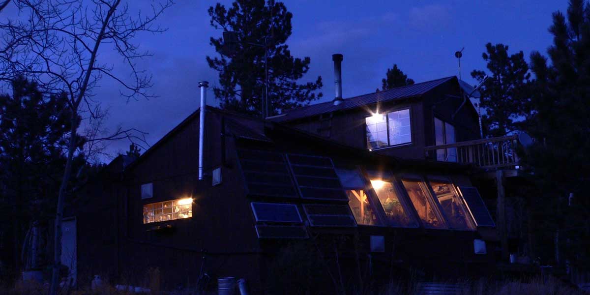 Image of house lit up at night