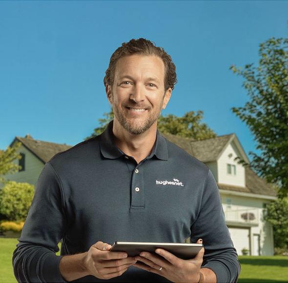 Installer outside of rural home with Hughesnet
