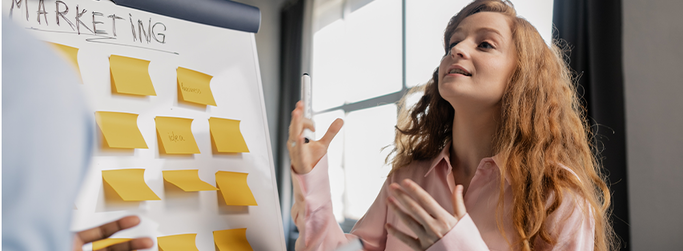 woman creating a marketing plan