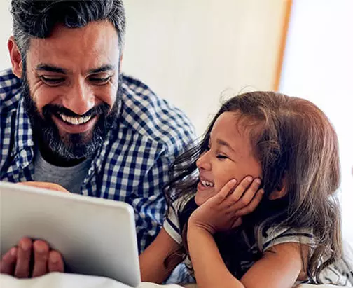 father and daughter using the Internet safely