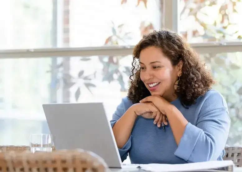 woman on laptop enjoying internet where she lives in puerto rico
