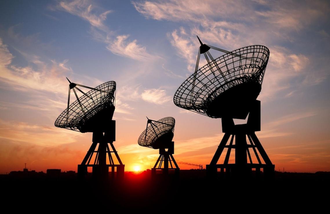 satellites with sunset in the background