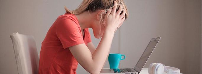 stressed student studying at home