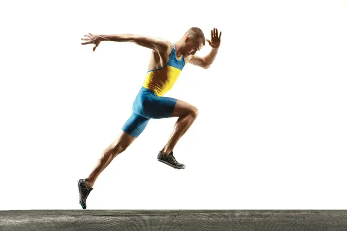 Sprinter mid-stride, representing the speed and performance of Hughesnet rural internet connectivity.