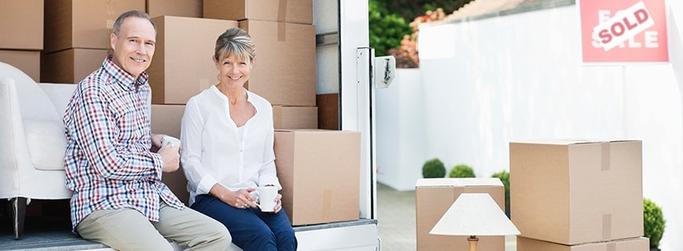 Image of couple moving houses