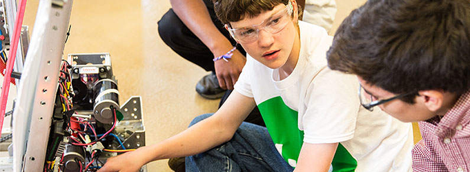 Image of boy learning science