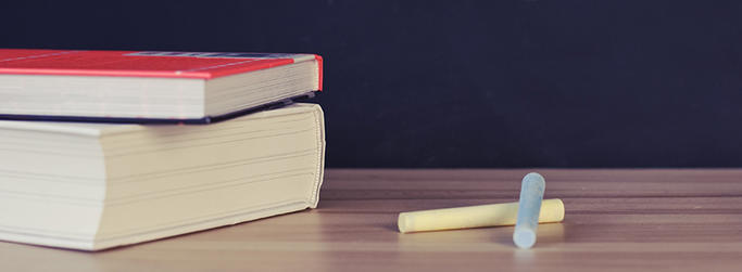 Chalk and schoolbooks image