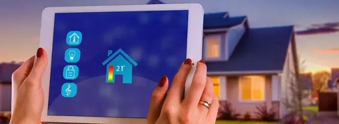 Smart home interface on a tablet, managing home automation with reliable satellite internet.