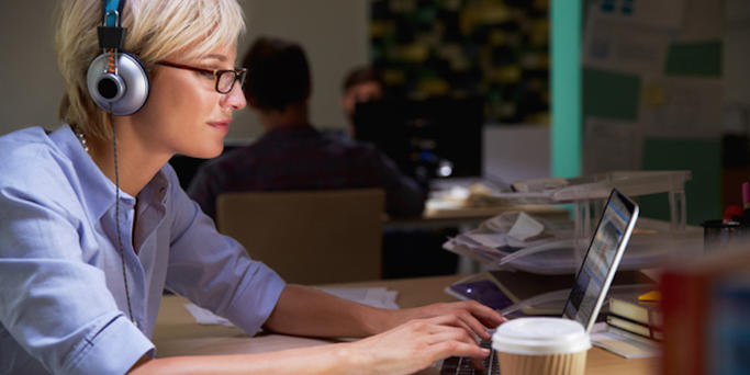 woman listening to a podcast